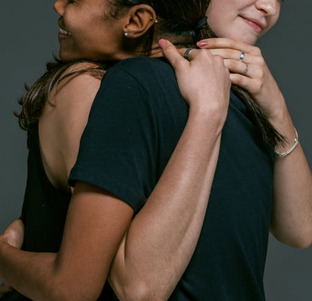 girls hugging