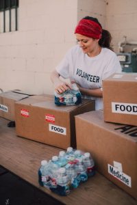 volunteer receiving donations